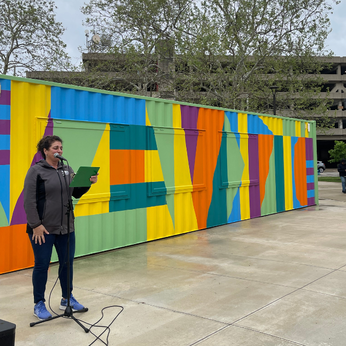 lisa speaking in front of concessions